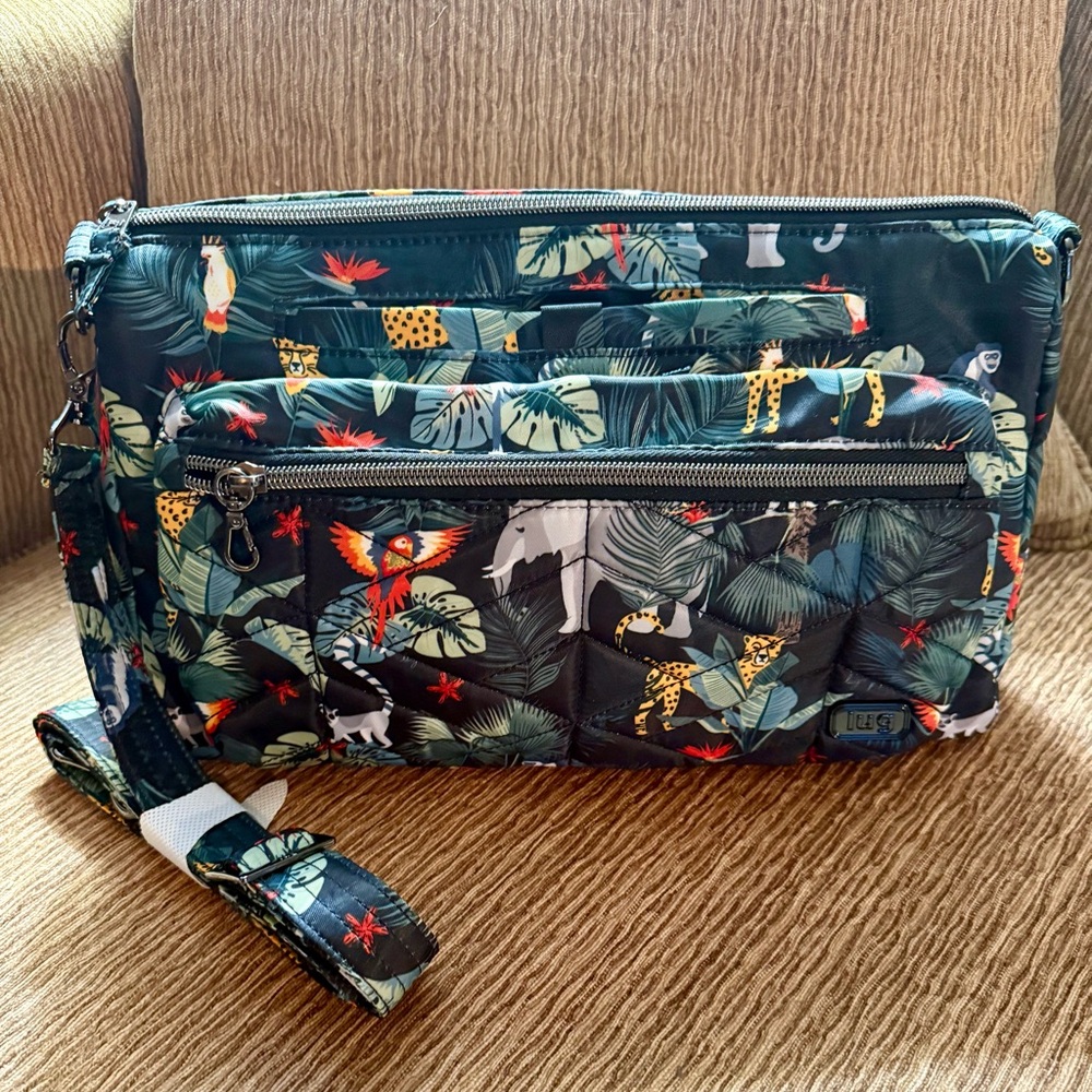 LUG Stretch crossbody bag in Wildlife Black print, NWOT.